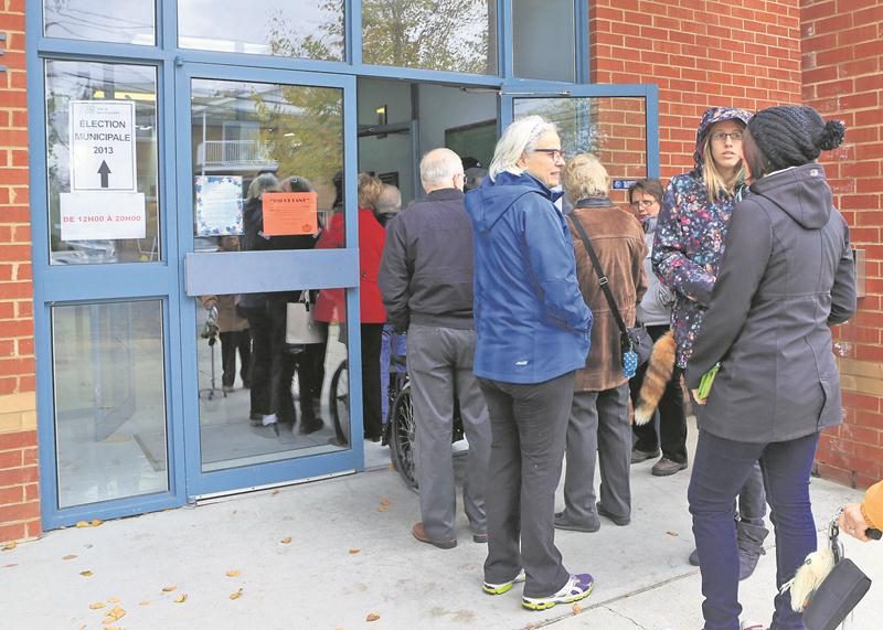 Pour éviter que se forment de longues files d’électeurs comme en 2013, la présidente d’élection a décidé d’ajouter des lieux de votation pour le vote par anticipation du 29 octobre.   Photothèque | Le Courrier ©
