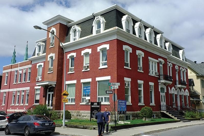 Édifice actuel au coin de l’avenue du Palais et de la rue Girouard. Photo Robert Mayrand - 2017