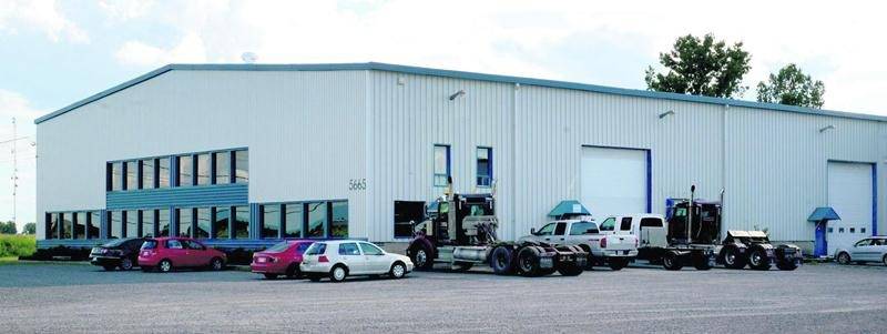 L’entreprise K&C Diesel loue une bâtisse industrielle dans le secteur Saint-Thomas-d’Aquin où elle n’est pas autorisée à opérer. Photo François Larivière | Le Courrier ©
