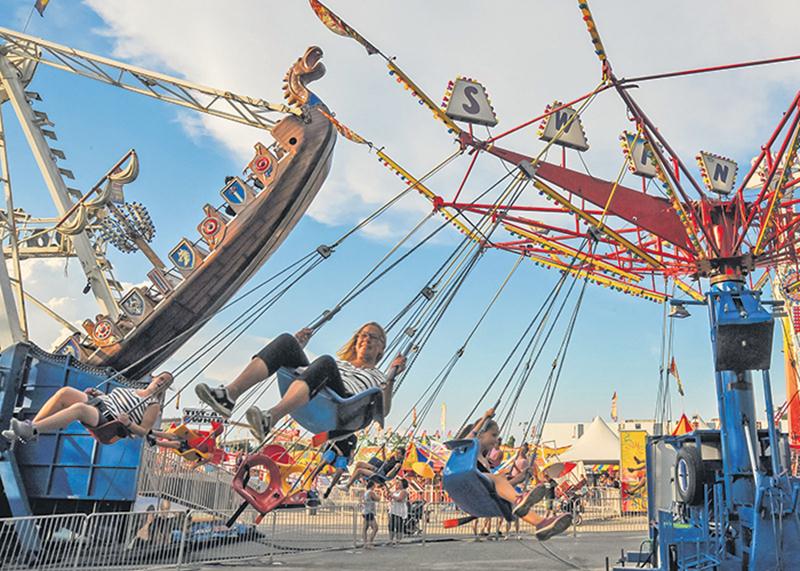 Cette année, les habitués de l’Expo ont découvert un espace manège regroupant des nouvelles attractions pour petits et grands. Photo François Larivière | Le Courrier ©