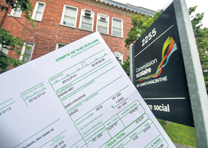 Comme à l’habitude, les contribuables devraient recevoir leur compte de taxe scolaire en juillet, mais il sera beaucoup plus léger cette année.   Photo François Larivière | Le Courrier ©