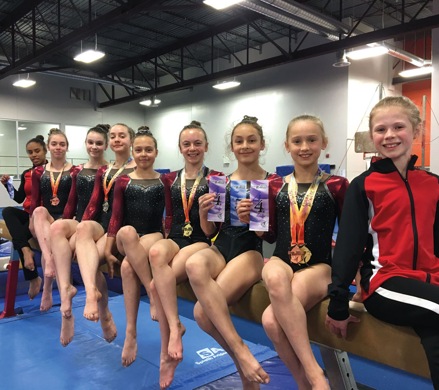 Un nombre record de neuf athlètes a représenté Gymnaska-Voltigeurs à la Coupe provinciale de gymnastique artistique, en mai, à Montréal. Photo gracieuseté